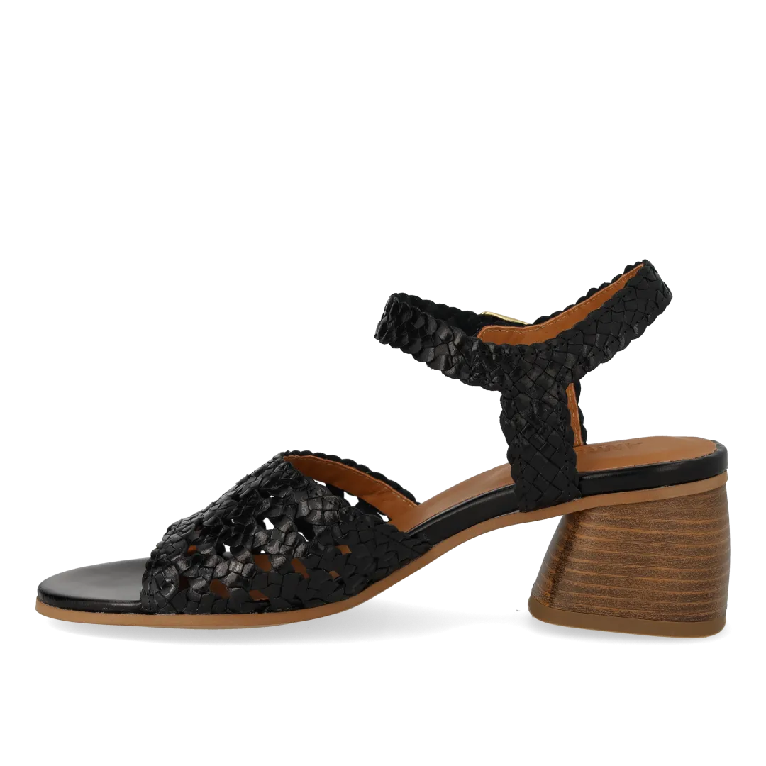 Hand-braided sandal with sculptural heel